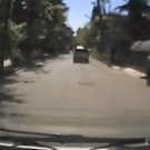 SUV flips after hitting manhole