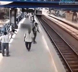 1368120722_policeman_saves_man_from_suic