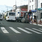 Pedestrian climbs over hood of car while crossing the street
