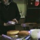 Girl sneezes on cake