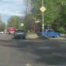 Woman steps out of burning car