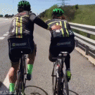 Helping disabled cyclist drink