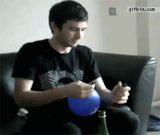 1309515838_playing_with_balloon_and_fire.gif