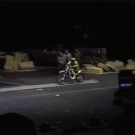 Biking synchronized double backflip