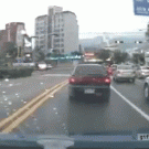 Kid falls out of car in intersection