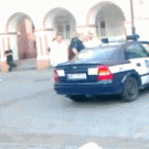 Guy helps friend escape from police car