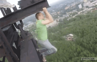 1340215268_russian_guy_hanging_from_tower_stunt.gif