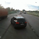 Lucky biker almost hits car