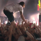 Crowdwalking rock star catches bear drinks from it