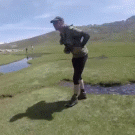 Guy laughs at friend falling in water