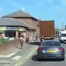 Woman almost hit in head by turning truck