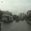 Guy almost hit by car while getting off tram