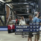 Guy trips and falls at baseball game