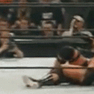 Wrestling referee makes spectacular entrance