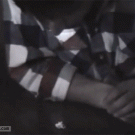 Guy picks up popcorn with his spit