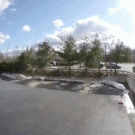 BMX rider jumps off roof
