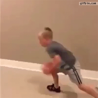 1436804785_dunking_kid_gets_hit_in_the_head_by_hoop.gif