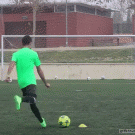 Kid practicing free kicks