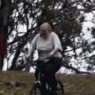 Grandma riding bike faceplants in the mud