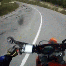 Biker hits deer