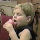 Kid falls asleep while eating ice cream