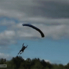 Paraglider swoop on water