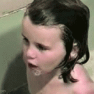 Little girl blowing bubbles