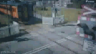 1284476168_car-almost-hit-by-train.gif