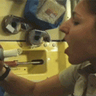 Woman drinking water in space