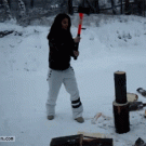 Girl chopping wood accidentally hits herself