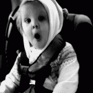 Baby on back seat really likes music