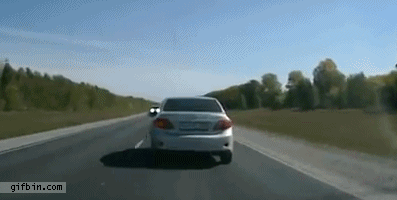 http://www.gifbin.com/bin/092012/1346863285_driver_doesnt_check_mirror_before_overtaking.gif