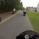 Girl falls off motorcycle between the seat and the tire