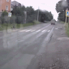 Woman crossing the street causes accident