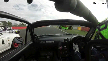 1409930893_racer_turns_opponents_side_mirror.gif