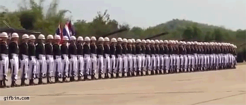 http://www.gifbin.com/bin/092014/1411049088_thailand_marines_domino_at_military_parade.gif
