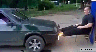 1412009889_man_holds_off_car_with_legs.gif