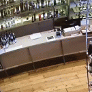 Guy catches falling wine bottle