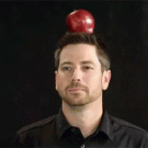 Apple on head golf trick shot