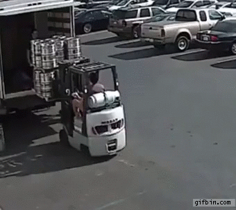 forklift-operator-catches-falling-beer-keg.gif