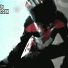 Biker falls off bike, gets back on