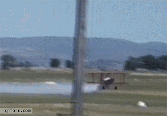 http://www.gifbin.com/bin/102012/1349977233_plane_lands_upsidedown.gif