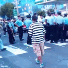 Policeman punches woman in the face