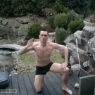 Guy jumps Cannon Ball into frozen pond