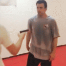 Taking gun from attacker