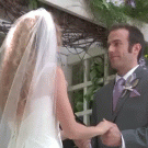Bride killing a mosquito during wedding
