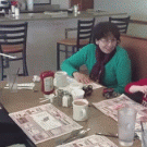 Girl hits brother in the ear with straw wrapper