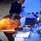 Guy puts scissors in socket