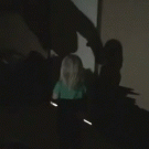 Little girl runs into door while playing with shadow