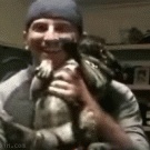 Dog pees in guys mouth